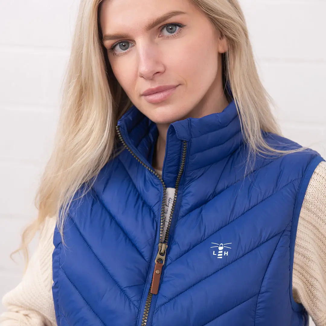 Blue quilted vest from Lighthouse Laurel, perfect for hunting and country clothing