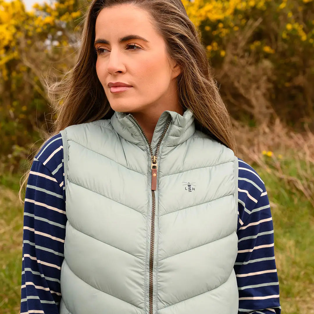 Light green Lighthouse Laurel Ladies gilet with full zipper and small chest emblem