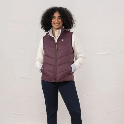 Lighthouse Laurel ladies puffer vest in deep plum with zip pockets, perfect for winter