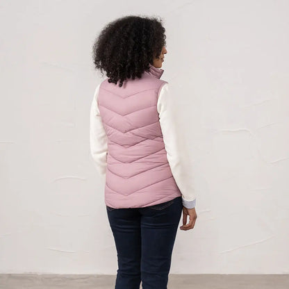 Pink quilted Lighthouse Laurel ladies gilet over white long sleeve shirt for stylish layering