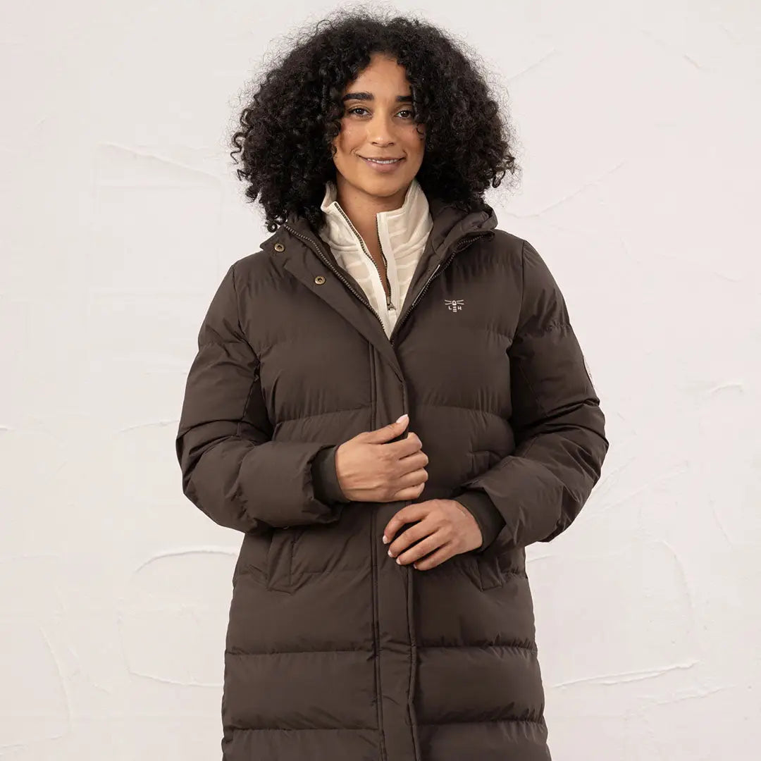 Woman wearing Lighthouse Savannah Coat with dark puffer and cream zip top