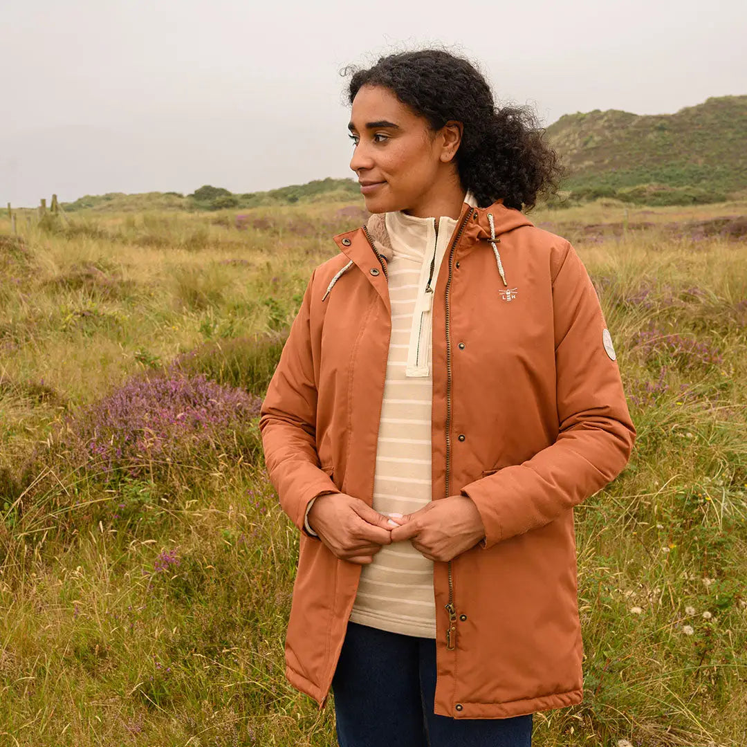 Woman in Lighthouse Scarlet Ladies Coat in country clothing for outdoors and hunting trips