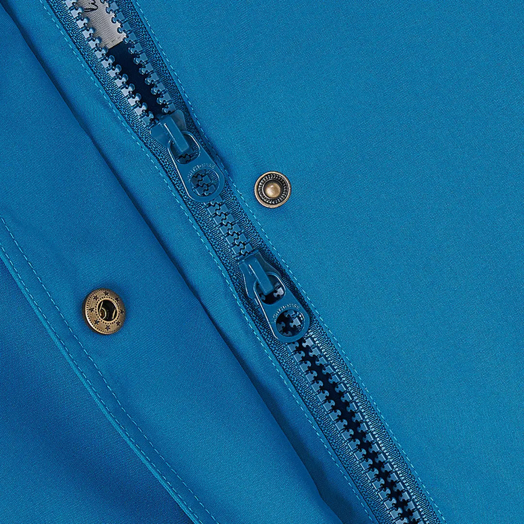 Close-up of blue zipper and snaps on Lighthouse Tess Ladies Coat for outdoor country clothing