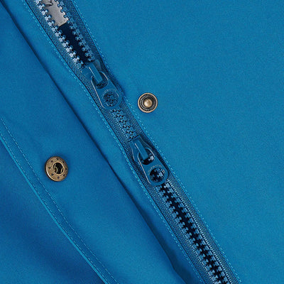 Close-up of blue zipper and snaps on Lighthouse Tess Ladies Coat for outdoor country clothing