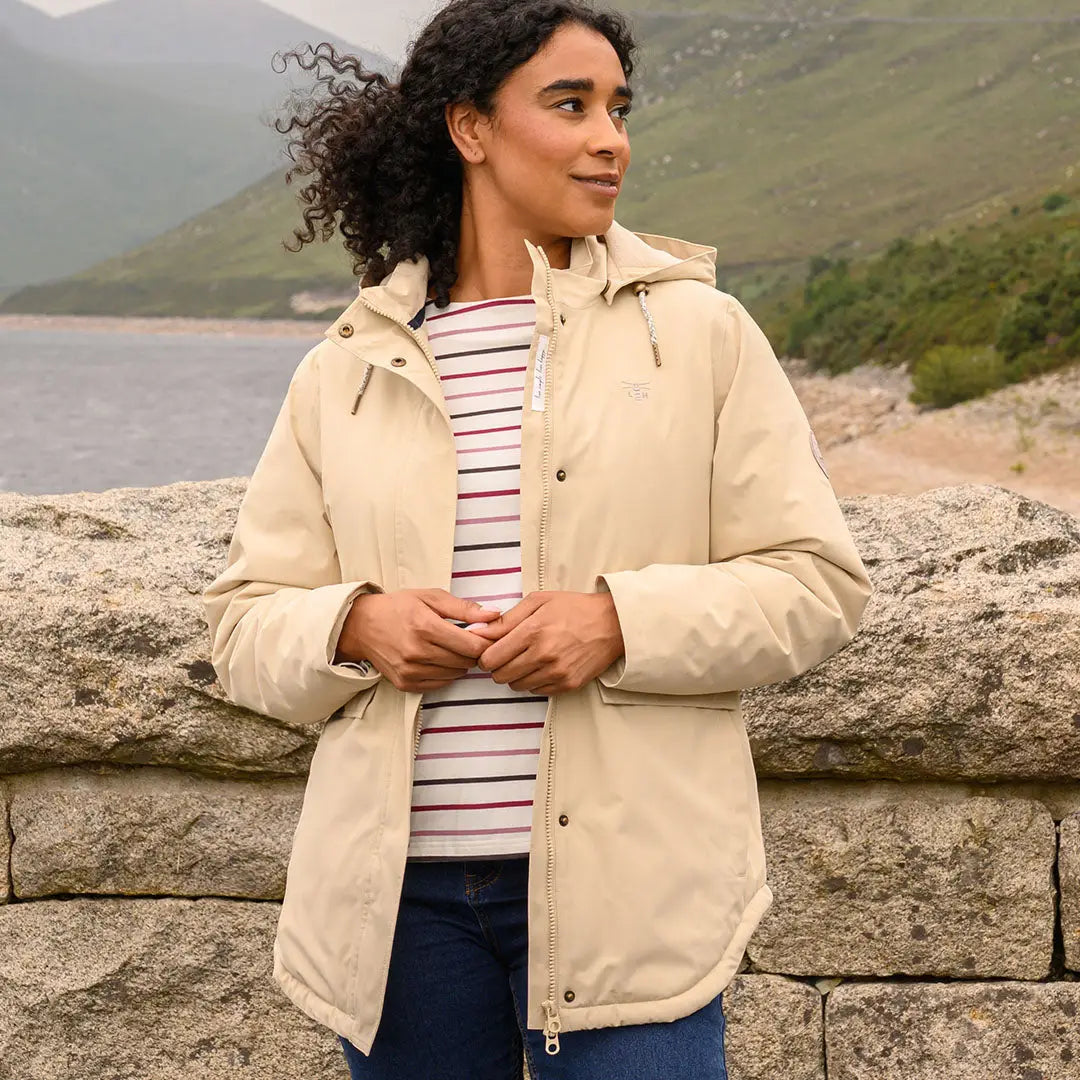 Woman in Lighthouse Tess Ladies Coat, perfect for country clothing and outdoor adventures