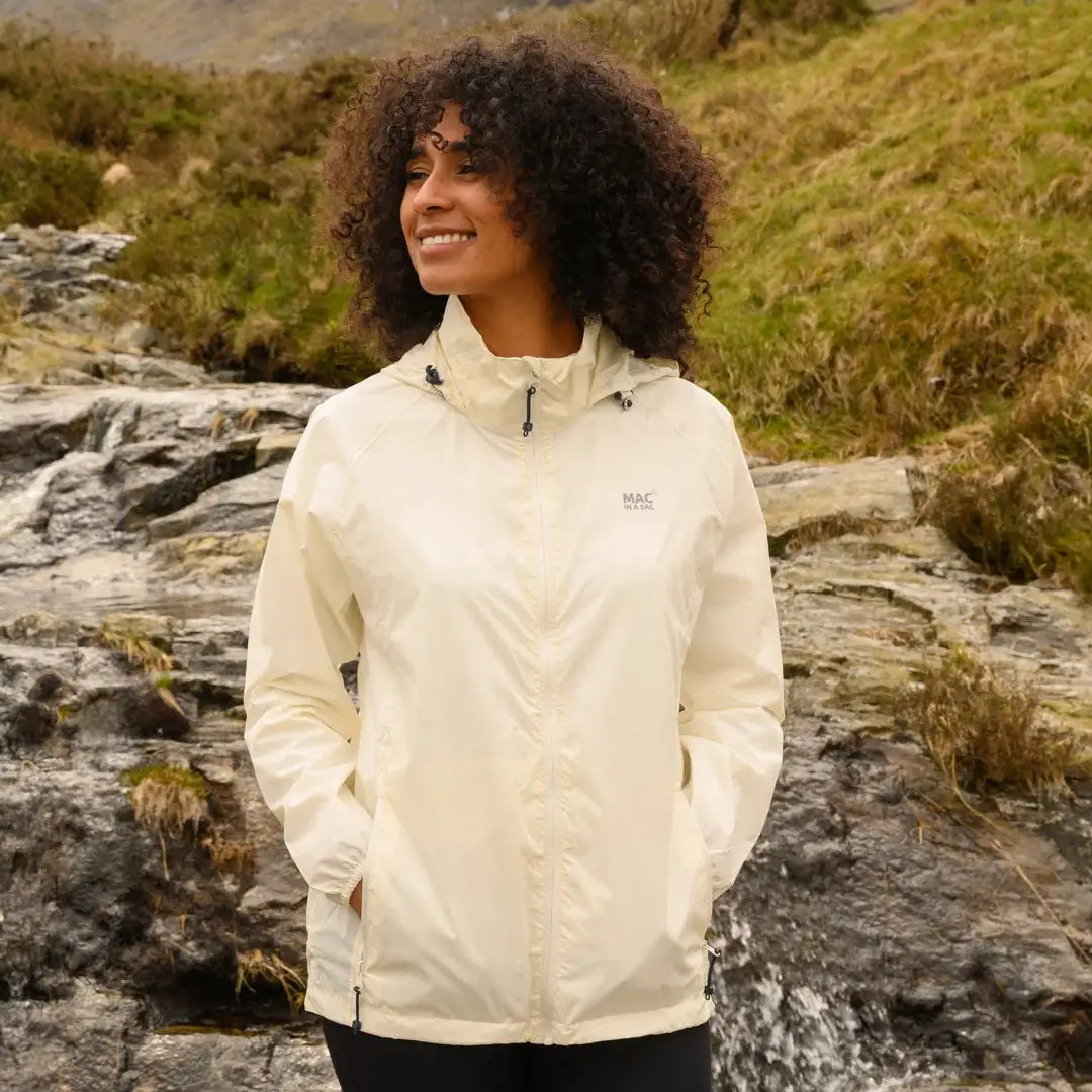 White Mac in a Sac Origin waterproof jacket with high collar and fully taped seams