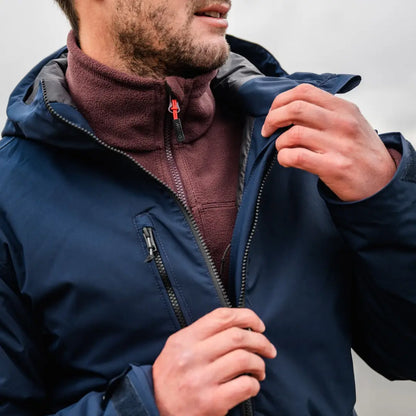 Navy blue Musto Corsica Primaloft rain jacket with a stylish burgundy collar