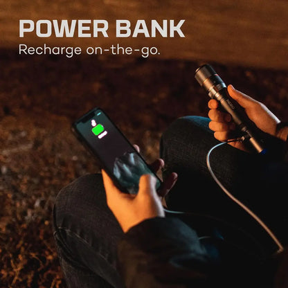 Power bank charging a smartphone, part of the NEBO Davinci 2000 with lumen rechargeable flashlight