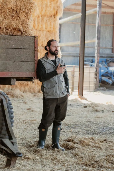 Bearded man in farm attire wearing New Forest Country Sport Trousers perfect for country sport