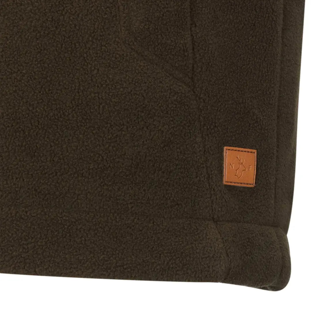 Brown fleece fabric with leather logo patch on New Forest Knightwood Gilet fleece gilet