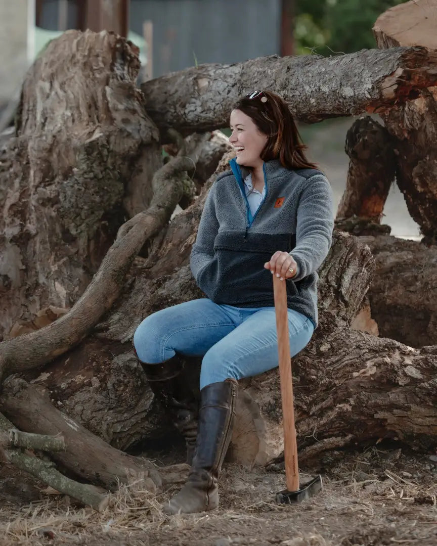 Woman with axe sitting on tree roots in New Forest Ladies Fox Fibre Pile Fleece