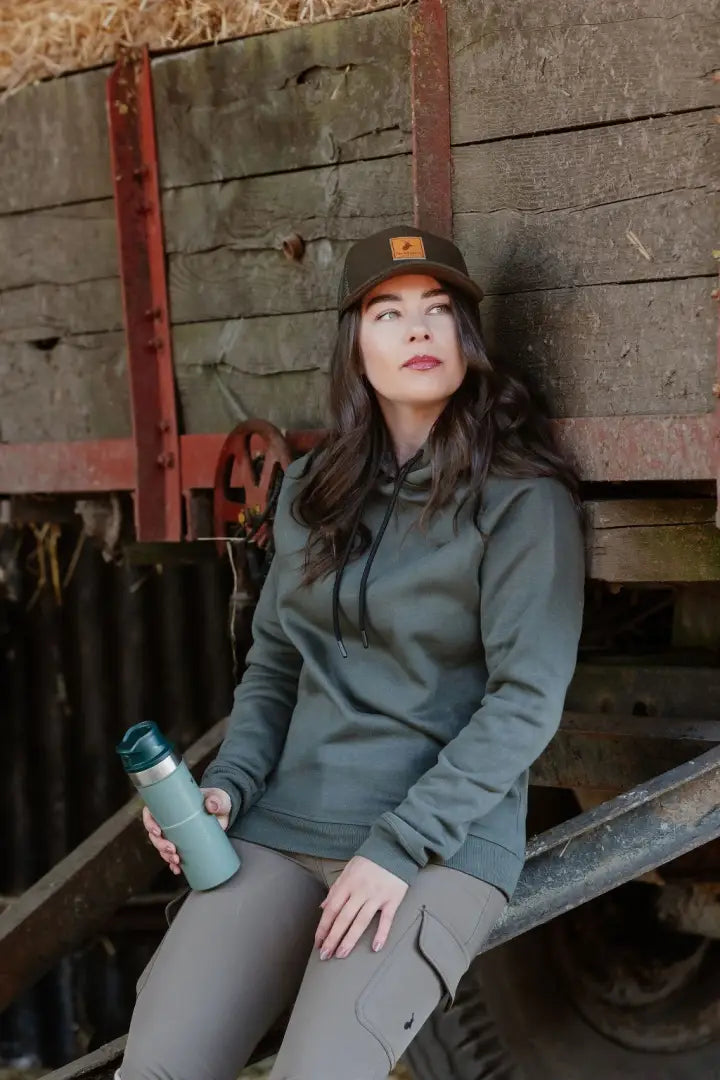 Woman in green forest harrier hoodie and cap, stylish New Forest Ladies Harrier Hoodie