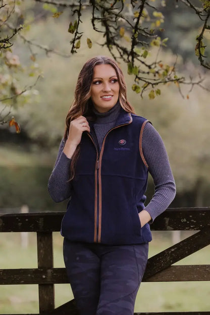 Navy fleece gilet with brown trim, perfect for warmth and style in chilly weather