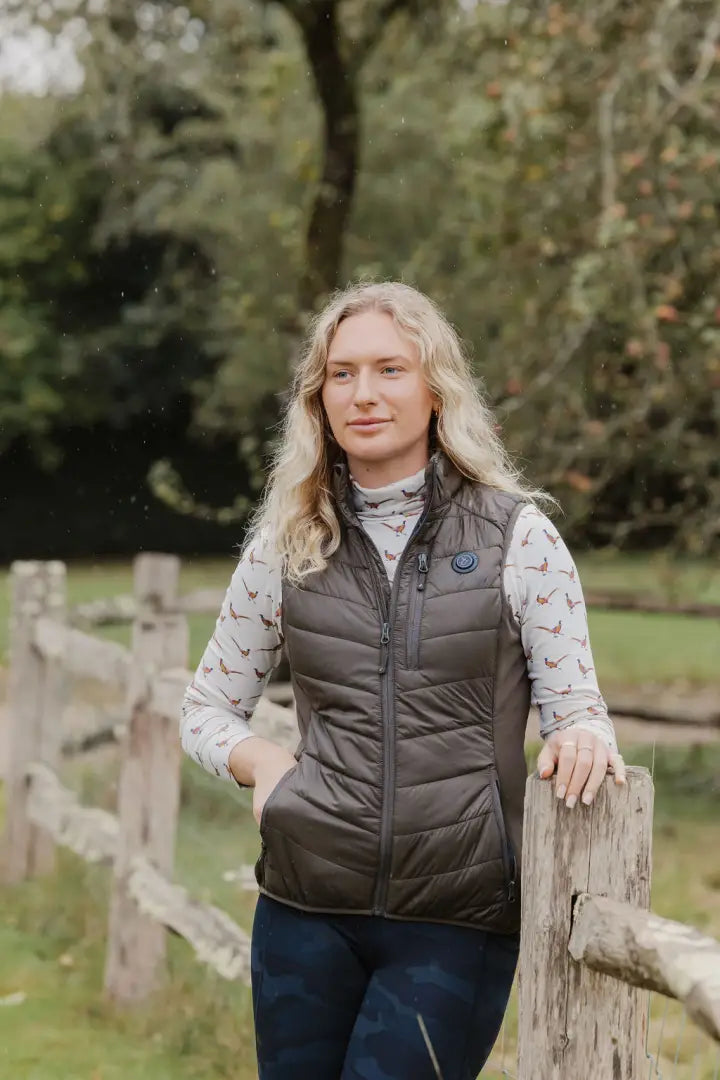Woman wearing a New Forest heated gilet, perfect for staying warm outdoors