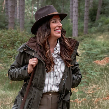 Woman in outdoor gear wearing the New Forest Ladies Marsh Jacket perfect for forest ladies