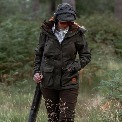 Woman in forest ladies marsh jacket perfect for outdoor adventures and hunting trips