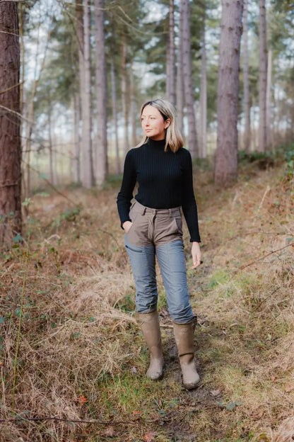 Woman wearing Forest Nightjar Trousers for outdoor adventures