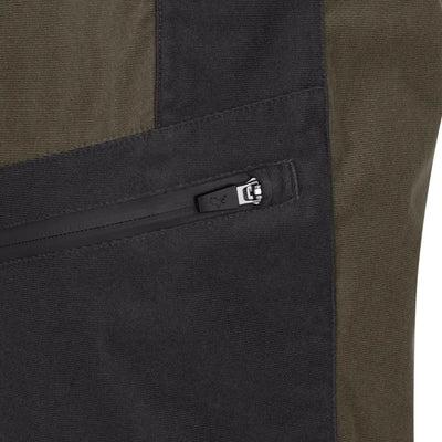 Close-up of a black zippered pocket on the olive green Forest Nightjar Trousers