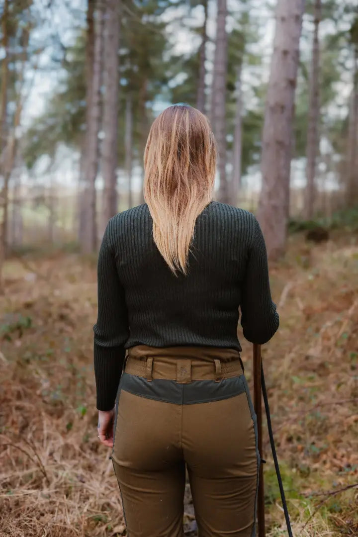 Woman wearing Forest Nightjar Trousers, perfect for outdoor adventures