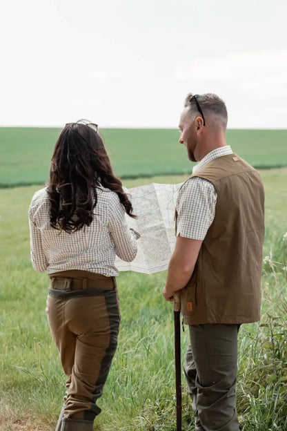 Two people exploring outdoors wearing New Forest Ladies Nightjar Trousers in the forest