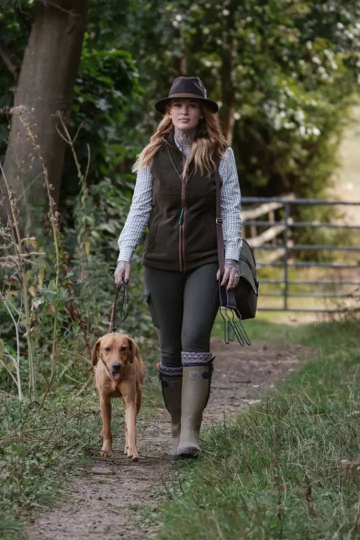 Woman in hat vest and boots walking dog in New Forest Favourite Country Shirt