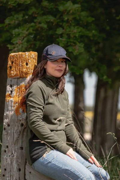 Woman in outdoor clothing wearing New Forest Ladies Trail Fleece on forest trail