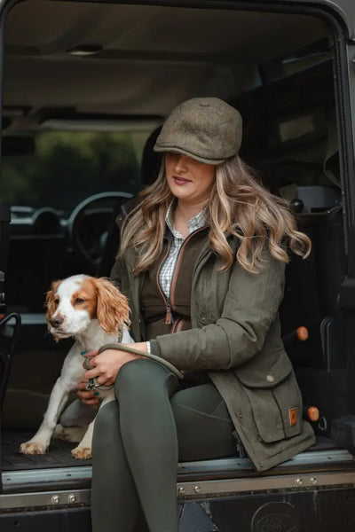 Woman in country attire with dog wearing New Forest Ladies Trek Leggings for forest trek