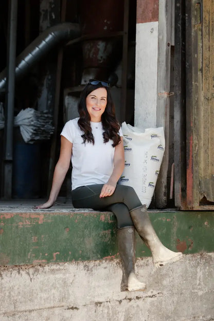 Woman in riding boots wearing New Forest Ladies Trek Leggings for forest trek style