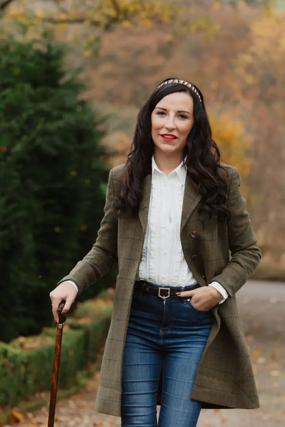 Woman wearing the stylish Forest Lizzie Tweed Coat, perfect for any occasion