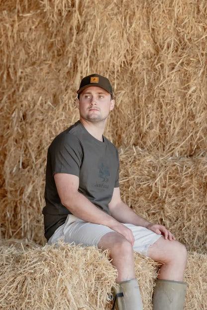 Man in farm attire.