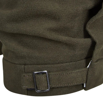 Sleeve cuff of a dark green military-style New Forest Moleskin Breeks with adjustable strap