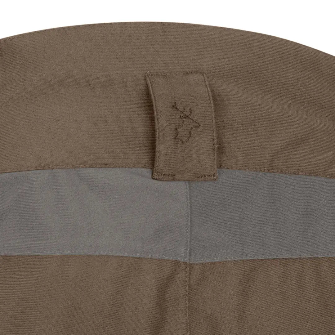 Tan fabric New Forest Nightjar Trousers with a stylish deer logo design