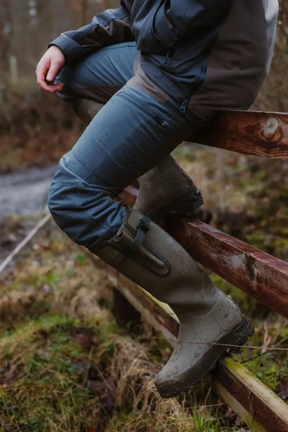 Green rubber boots paired with New Forest Nightjar Trousers for stylish outdoor adventures