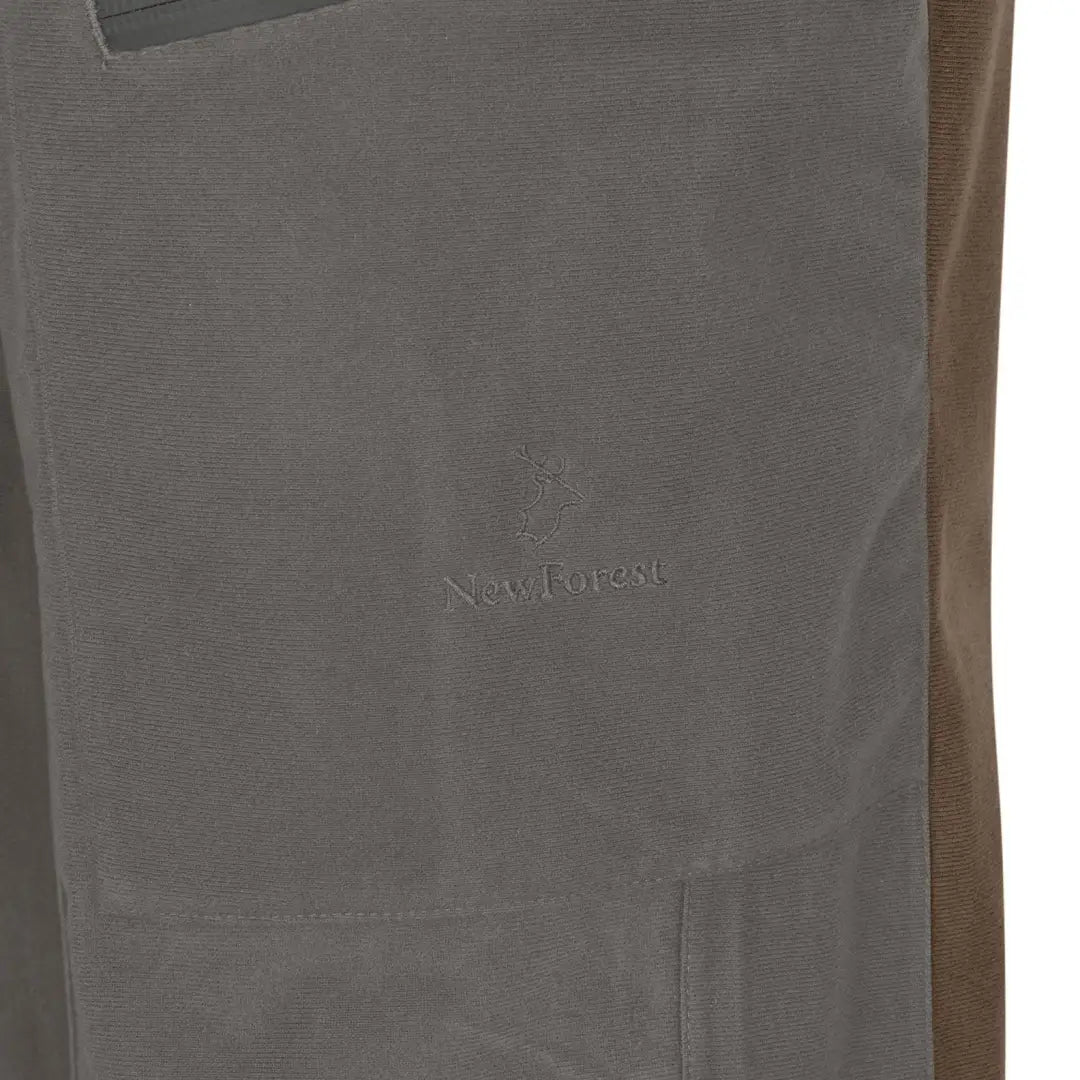 Gray and brown pants for men, featuring the stylish New Forest Nightjar Trousers design