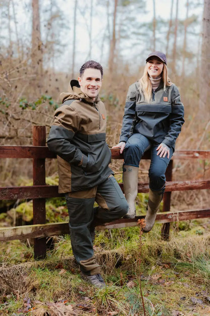 Two people outdoors wearing Forest Nightjar Trousers for a stylish adventure
