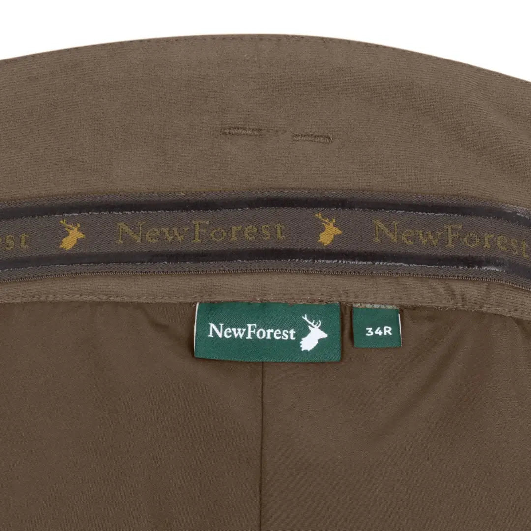Brown interior of New Forest Nightjar Trousers with brand label visible
