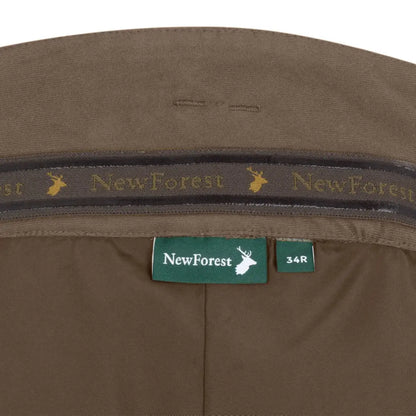 Brown interior of New Forest Nightjar Trousers with brand label visible