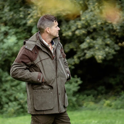 Man in profile wearing New Forest Performance Field Coat, perfect for forest clothing