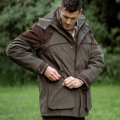 Brown waterproof performance field coat with pockets and high collar for outdoor adventures
