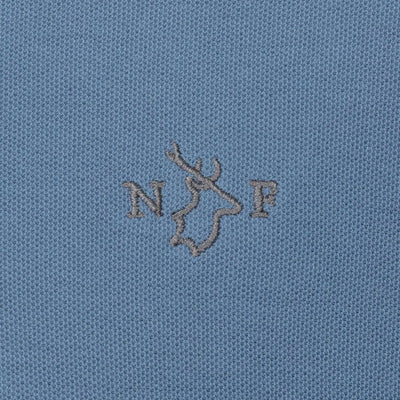 Blue fabric of the New Forest Pique Polo Shirt with embroidered logo detail