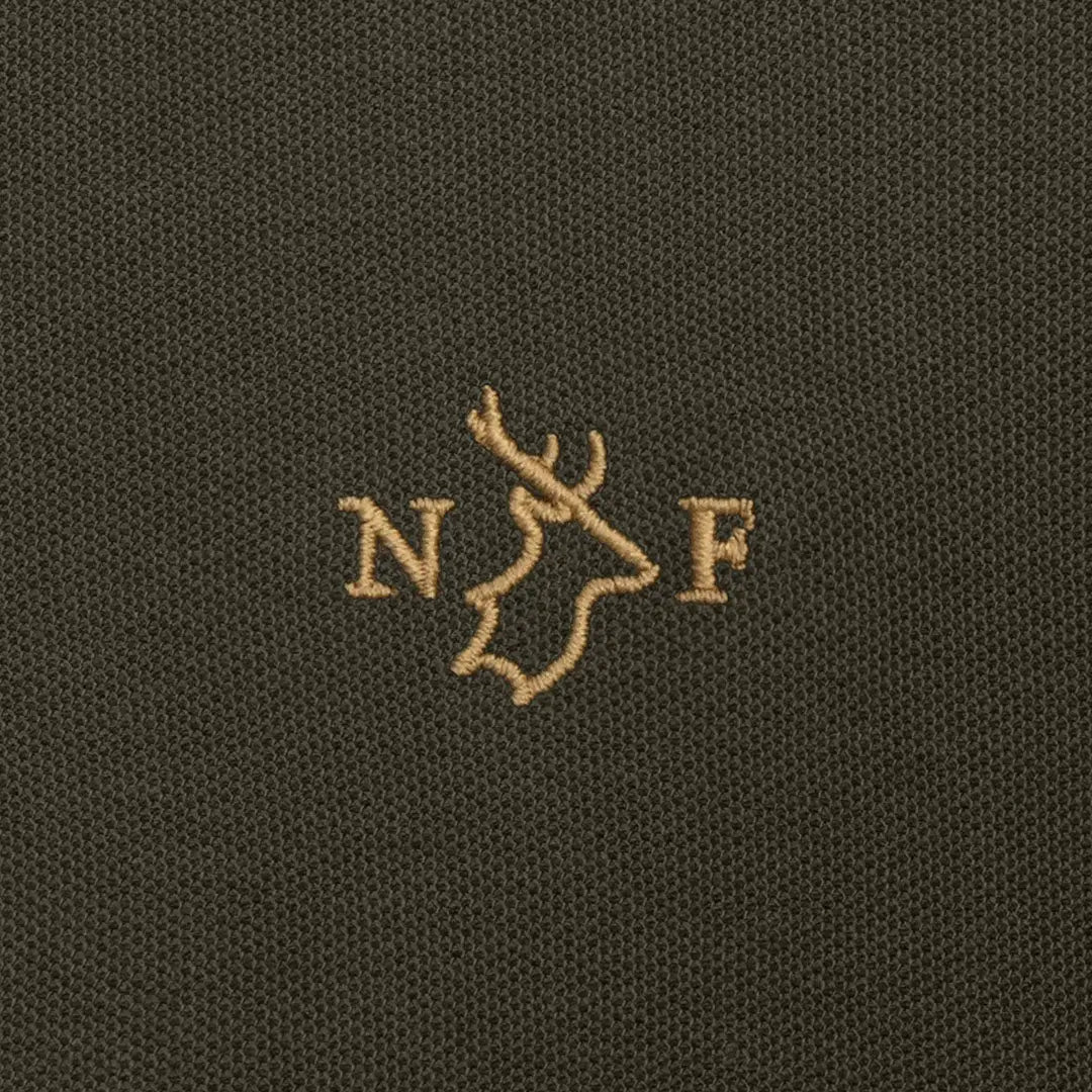 Embroidered deer head logo on a stylish New Forest Pique Polo Shirt