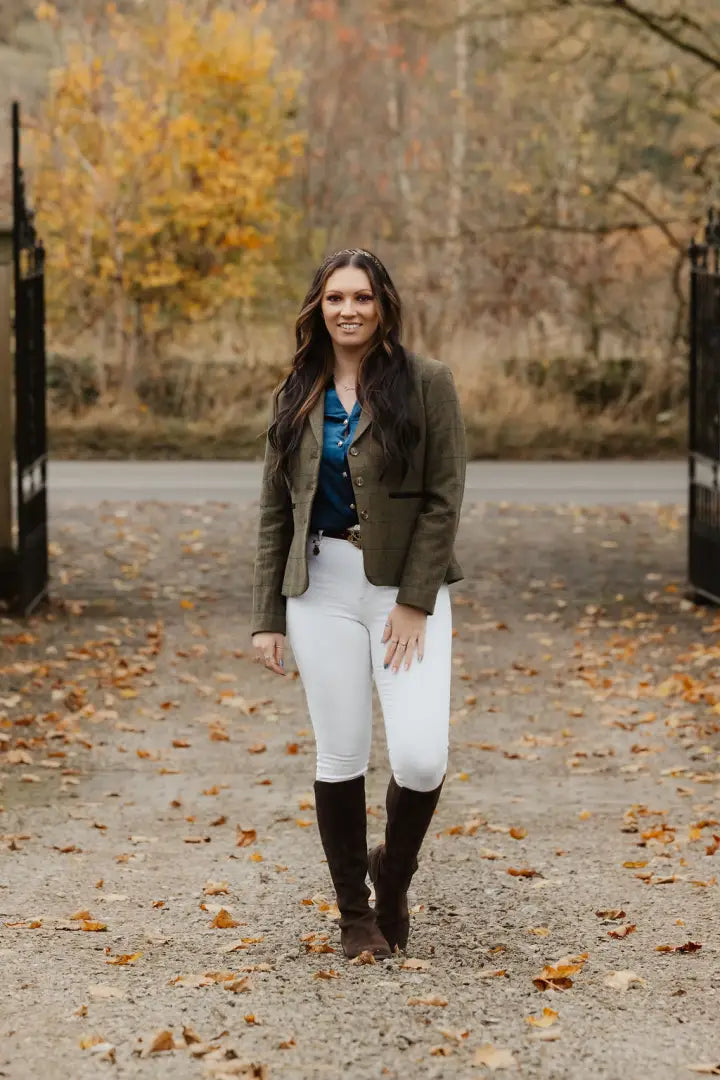 Woman in equestrian attire rocking the New Forest Polly Tweed Blazer for stylish comfort