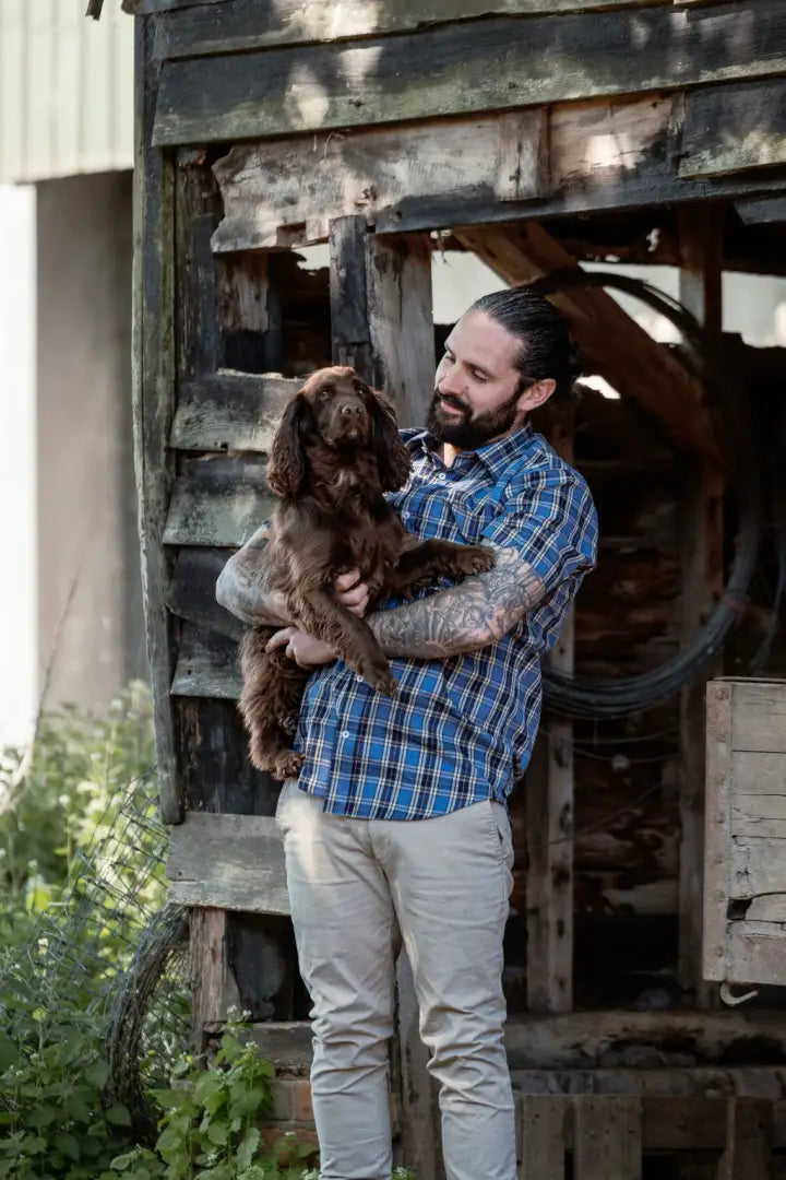Man holding brown dog wearing New Forest Premium 100% Cotton Short Sleeve Shirt