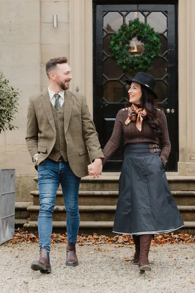 Couple holding hands in a stylish New Forest Premium Wool Tweed Blazer