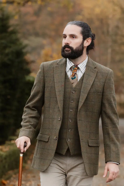 Man wearing New Forest Premium wool tweed waistcoat with checked blazer and trousers
