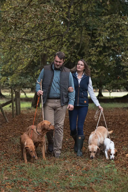 Couple walking four dogs outdoors wearing New Forest Premium fleece lined shirt