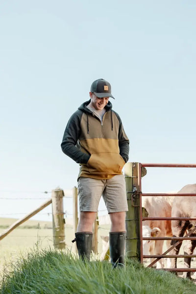 Man in outdoor clothing wearing the New Forest Raptor Hoodie, perfect for forest raptors