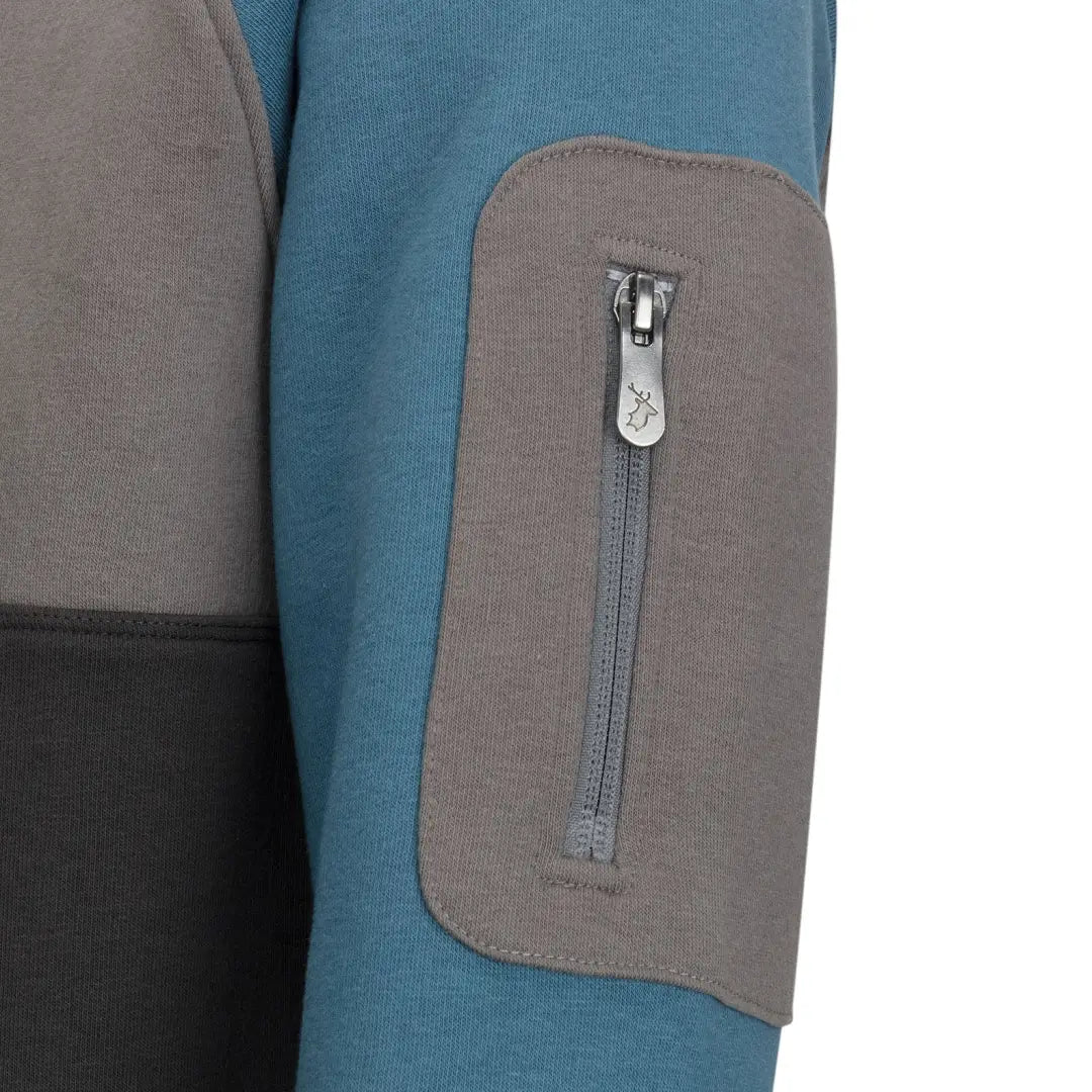 Blue and gray fleece sleeve with zippered pocket on the New Forest Raptor Hoodie