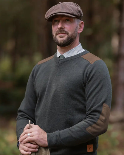 Men’s dark green forest raven V neck jumper with brown shoulder and elbow patches