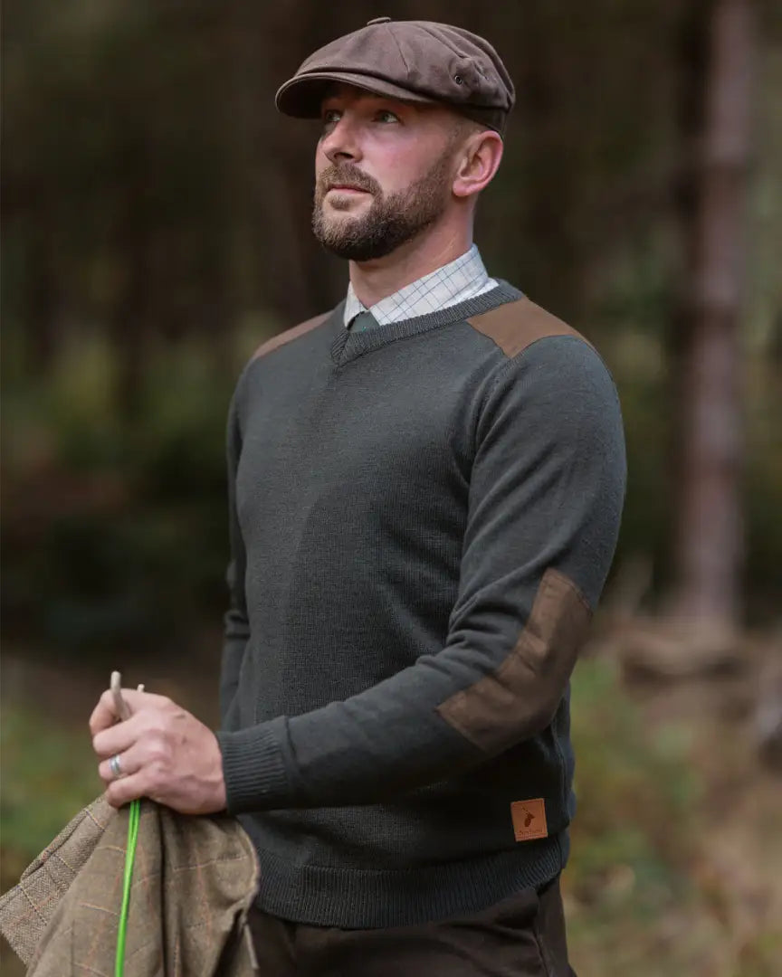 Men’s dark green Forest Raven V neck jumper with brown elbow and shoulder patches